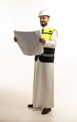 Saudi Male Engineer Holding Blueprint in Safety Gear