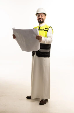 مهندس سعودي يحمل مخططات هندسية على خلفية بيضاء