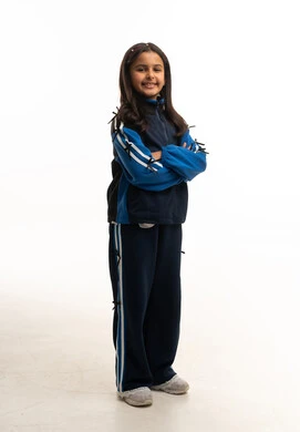 Saudi Girl in Blue Tracksuit on White Background