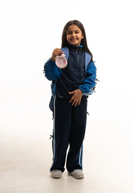 Saudi Schoolgirl with Backpack and Alarm Clock