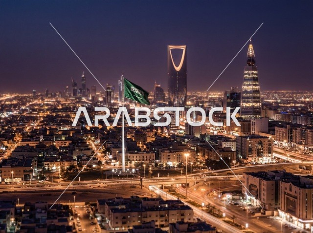 Riyadh Skyline at Night with Saudi Flag and Skyscrapers