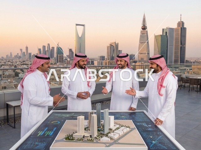 Saudi Businessmen in Riyadh with Real Estate Model