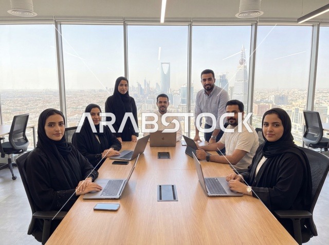 Saudi Team in Riyadh Office with City Skyline View