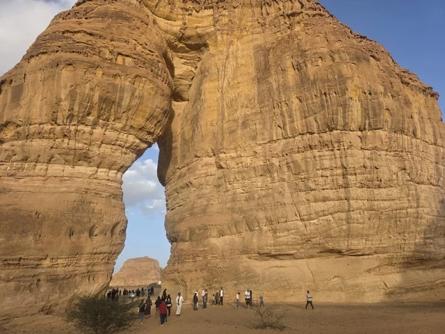 AlUla Saudi Arabia Sandstone Rock Arch and Tourists