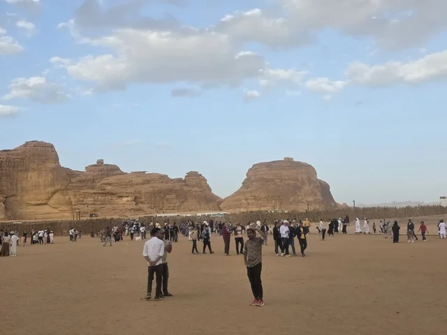 Tourists in AlUla Saudi Arabia Desert Landscape