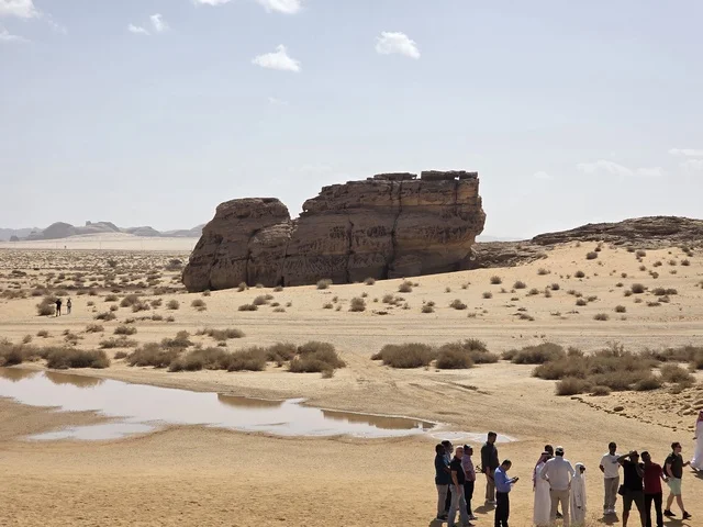 Tourists at AlUla Desert Rock Formations Saudi Arabia