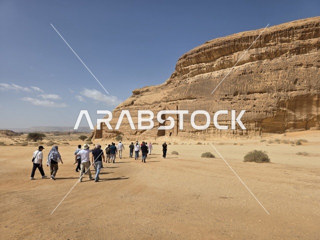 Tourists Visiting Hegra Ancient Rock Tombs AlUla