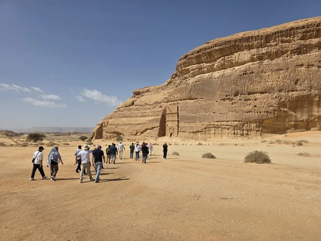 Tourists Visiting Hegra Ancient Rock Tombs AlUla