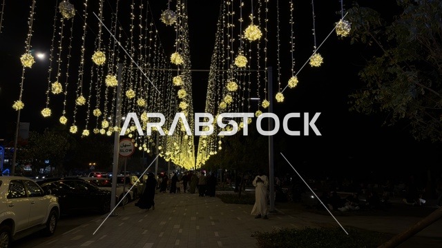 Eid Celebrations in Dammam with Hanging Lights at Night
