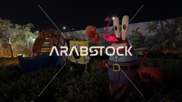 SpongeBob Statues at Wonder Garden Al Jubail at Night
