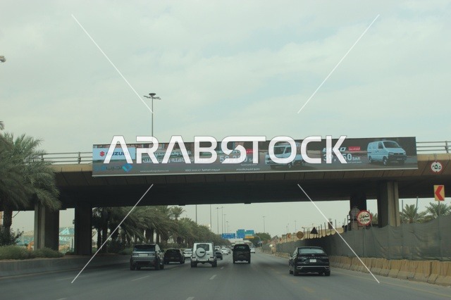 Traffic Under Bridge with Billboard Riyadh Saudi Arabia