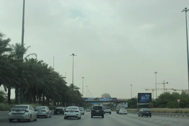 Highway Traffic with Palm Trees in Riyadh Saudi Arabia