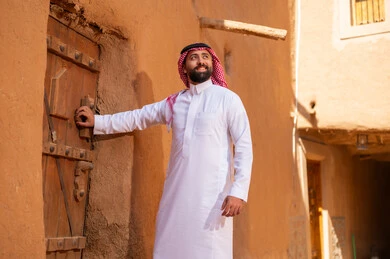 Saudi Man in Traditional Thobe at Heritage Mud Village