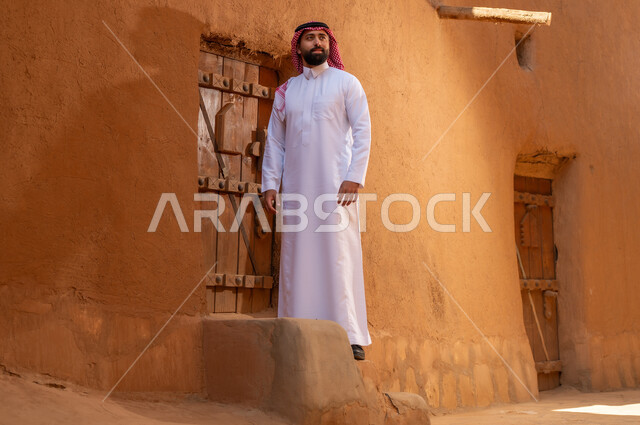 Saudi Man in Traditional Thobe at Heritage Mud House