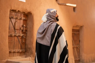 Saudi Man in Traditional Heritage Dress at Mud Village