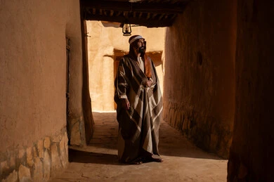 Saudi Man in Traditional Attire at Heritage Village