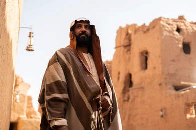 Saudi Man in Traditional Bisht at Historical Heritage Site