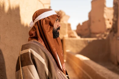 Saudi Man in Traditional Heritage Clothing at Ruins