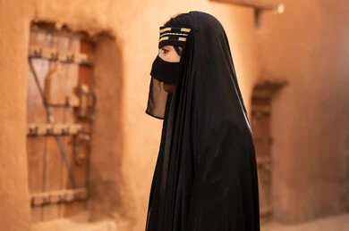 Saudi Woman in Traditional Abaya at Heritage Village