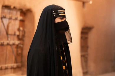 Saudi Woman in Traditional Najdi Dress Historical Site