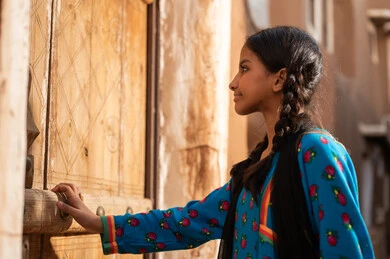Saudi Girl in Traditional Dress at Heritage Mud House