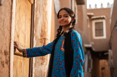 Saudi Girl in Traditional Dress at Heritage Village