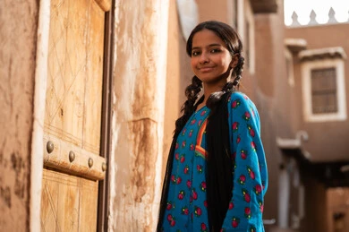 Saudi Girl in Traditional Dress at Heritage Village