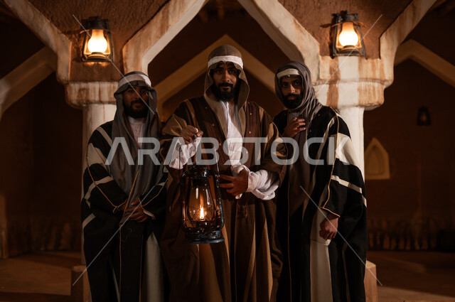 Saudi Men in Traditional Heritage Clothing with Lantern