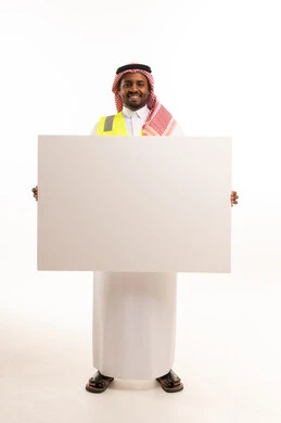 Saudi Professional Holding Large Blank Sign in Studio