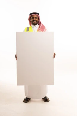 Saudi Man in Safety Vest Holding Blank White Board