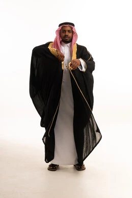 Saudi Man in Traditional Black Bisht on White Background