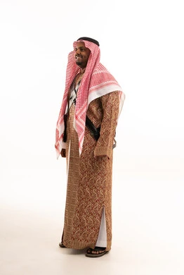 Saudi Man in Traditional Bisht and Shemagh Standing