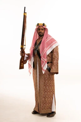 Saudi Man in Traditional Ardah Dress with Rifle