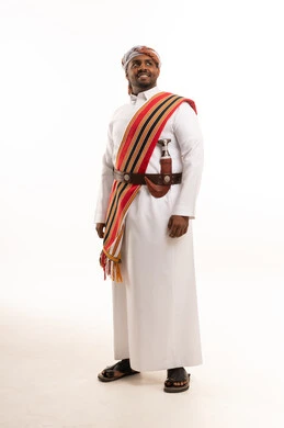 Omani Man in Traditional Dishdasha and Khanjar