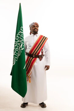 Saudi Man in Southern Heritage Dress with Flag