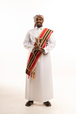 Omani Man in Traditional Dress with Incense Burner
