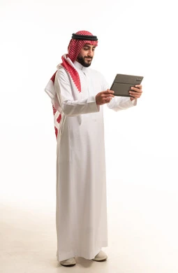 Saudi Man with Tablet on White Studio Background