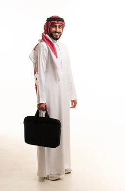Saudi Businessman in Traditional Thobe with Laptop Bag