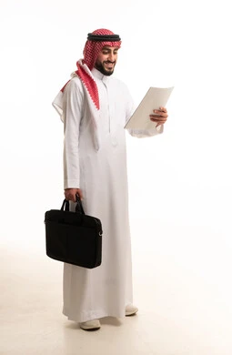 Saudi Businessman in Traditional Thobe Holding Briefcase