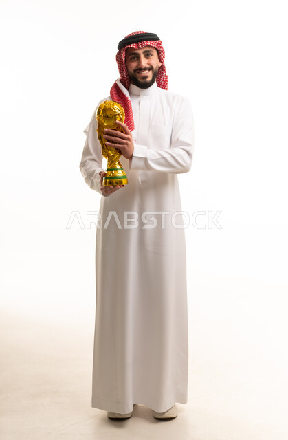 Saudi Man Holding Gold Trophy in White Studio