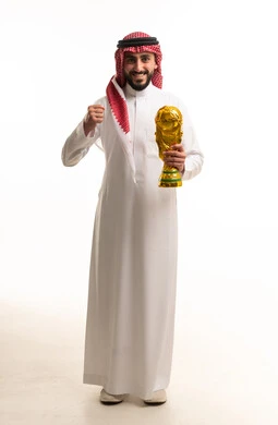 Saudi Man Holding Gold Trophy on White Background