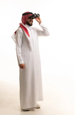 Saudi Man with Binoculars in Studio Setting