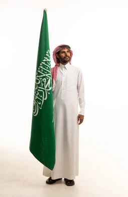Saudi Man with National Flag on White Background
