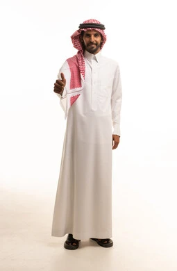 Saudi Man in Traditional Thobe Giving Thumbs Up