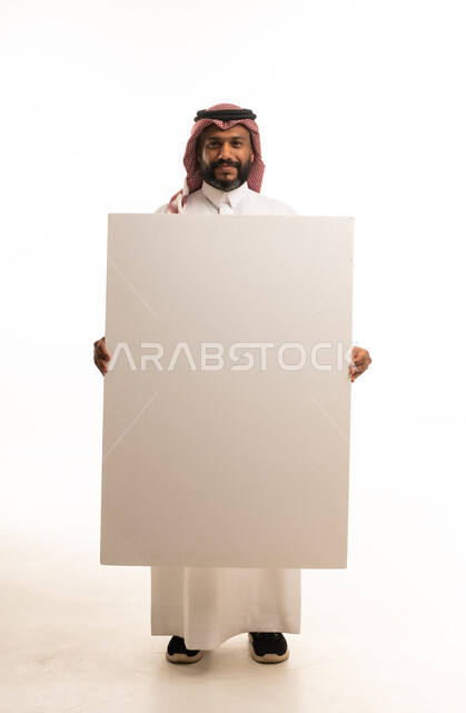 Saudi Man Holding Blank White Board Studio Shot