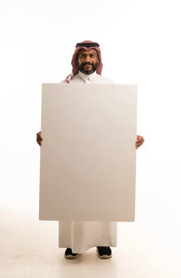 Saudi Man Holding Blank White Board Studio Shot