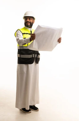 Saudi Engineer Holding Construction Blueprint Plans