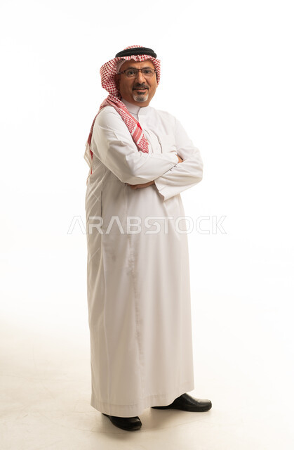 Saudi Man in Traditional Thobe Standing on White Background