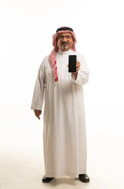 Saudi Man Holding Smartphone on White Background
