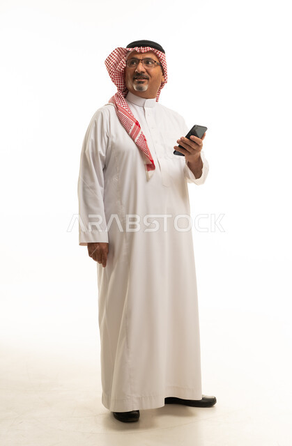 Saudi Man with Smartphone on White Background